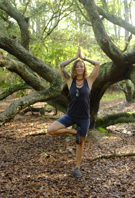 Yoga instructor in a peaceful meditation pose